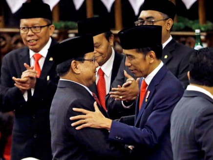 Indonesian President Joko Widodo is congratulated by the Mr Prabowo Subianto, who was his election rival, after his presidential inauguration for the second term, at the House of Representatives building in Jakarta, Indonesia on Oct 20, 2019.